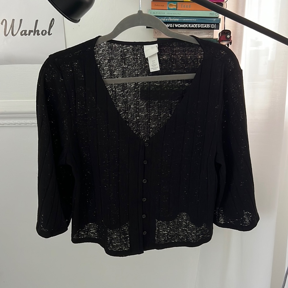 Black semi-sheer airy top.